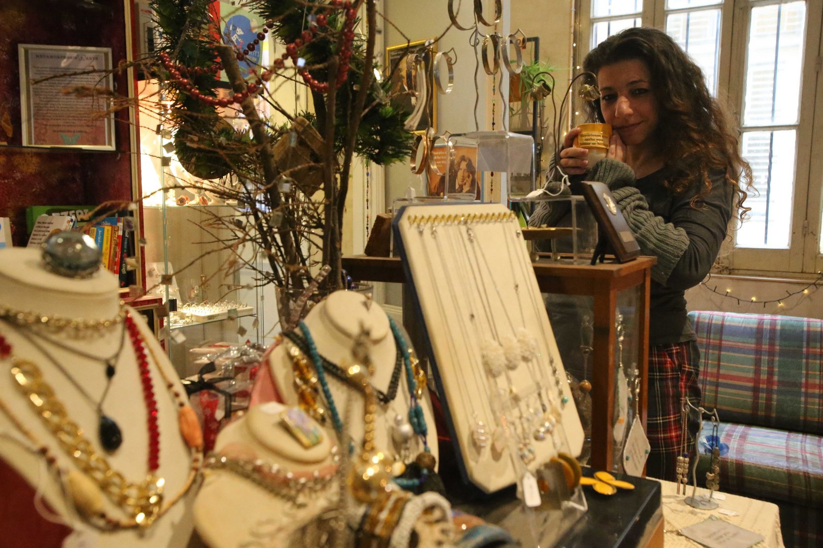 image Woman and shop are both many things