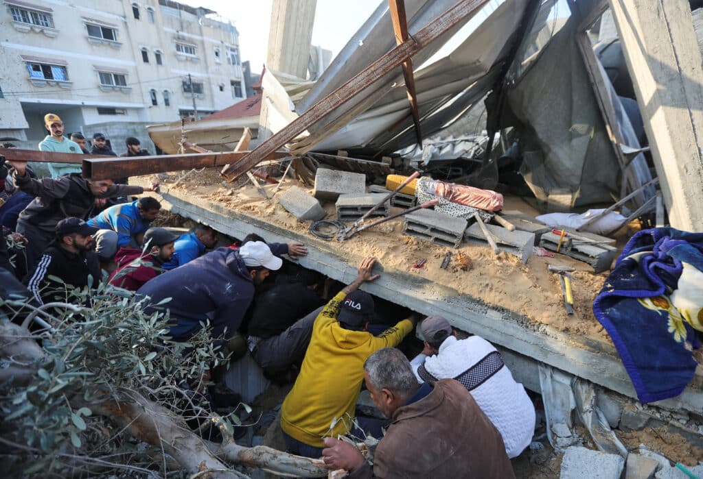 aftermath of an israeli strike on a house in rafah