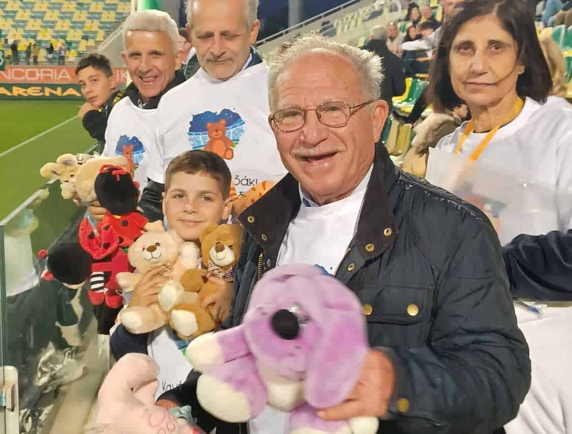 image Hundreds of teddy bears thrown onto pitch