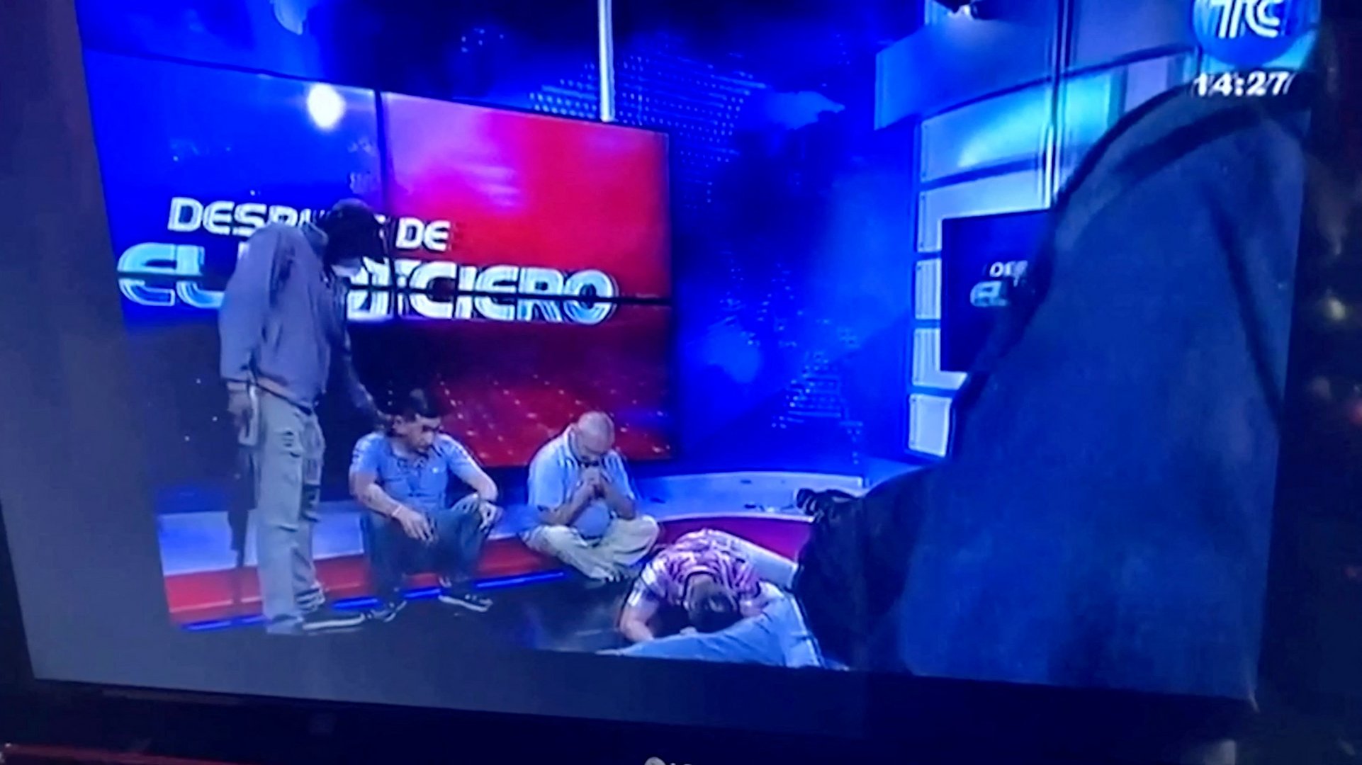 image Ecuador roiled by on-air take-over of TV studio by gunmen, other violence