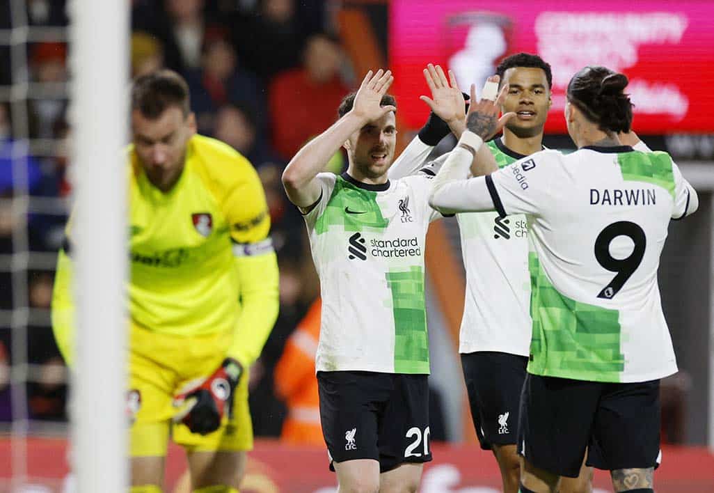 image Liverpool breeze past Bournemouth to go five points clear