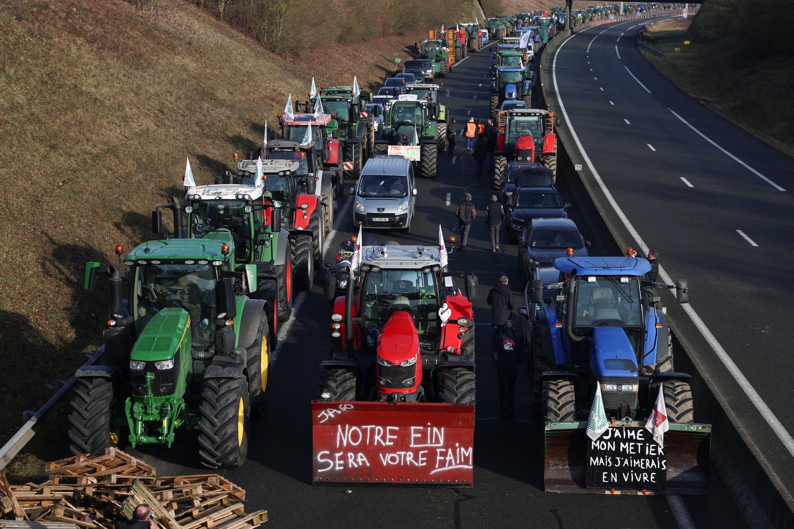 image France to push for EU law changes as farmers block Paris highways