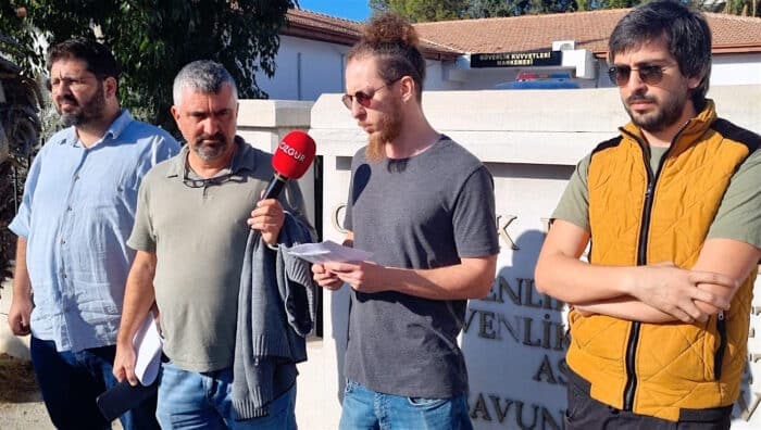 feature tom mustafa hurben speaking outside court
