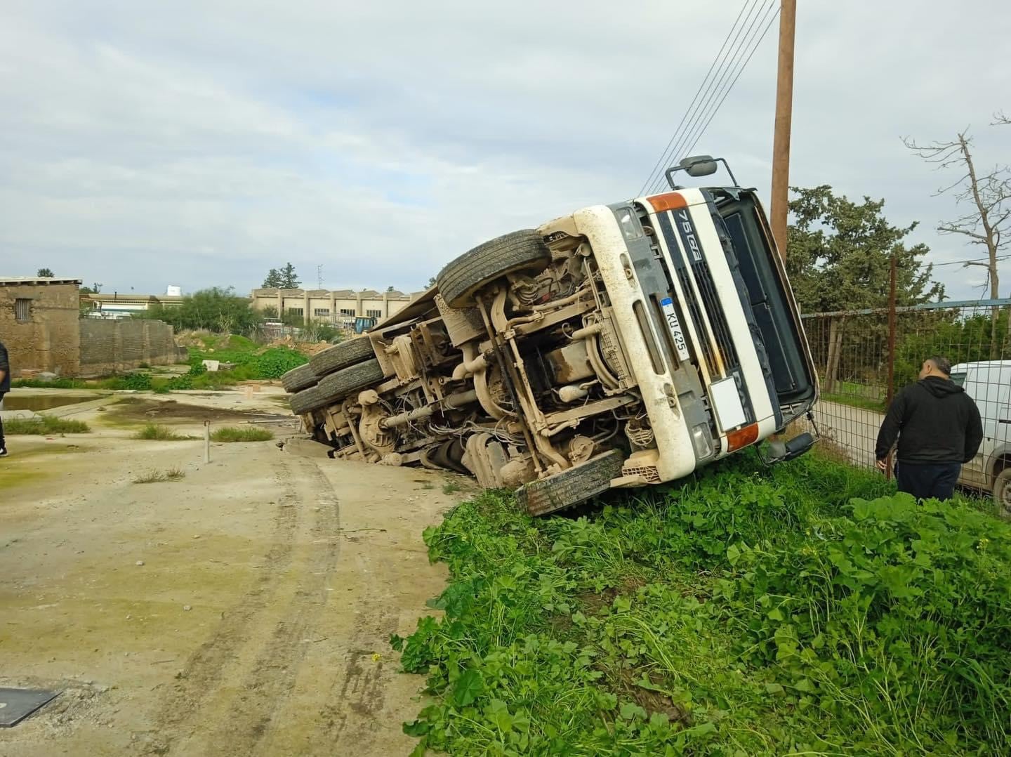 image Sewage lorry falls into septic tank