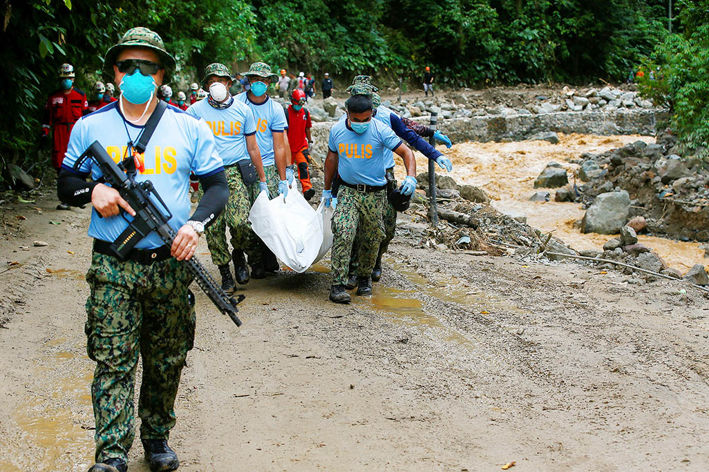 image Death toll from Philippines landslide jumps to 68