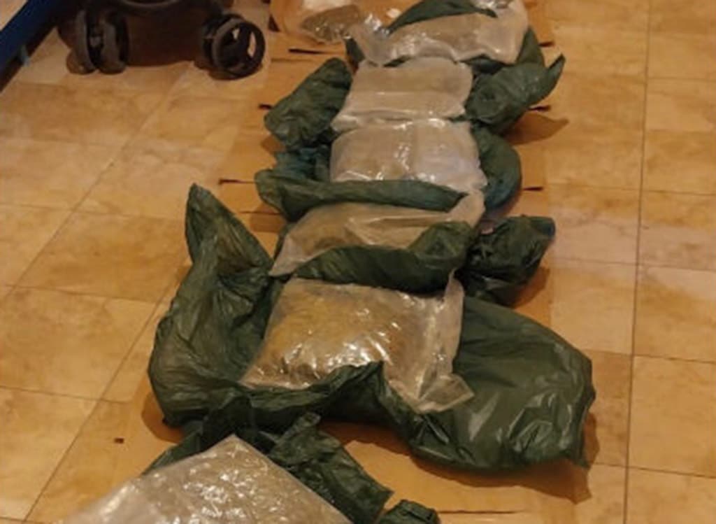image Second arrest after large amount of drugs, cash found