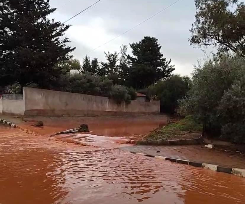 image Zodia flooded as brook bursts banks
