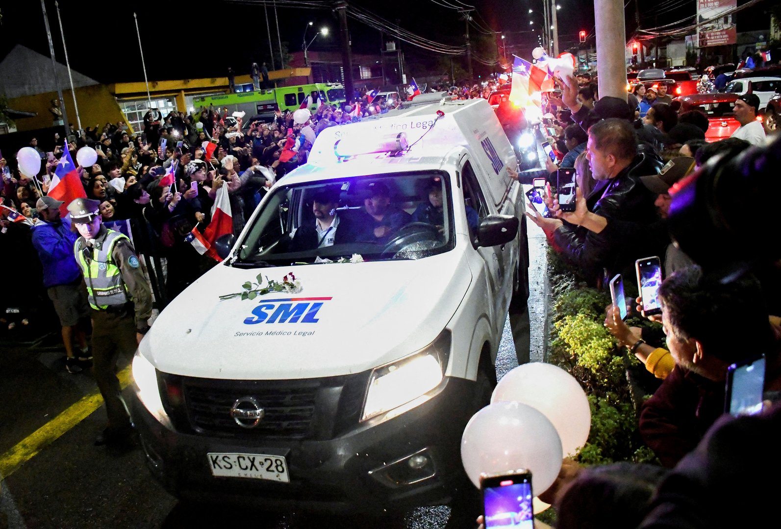 image Chileans throng streets for former president&#8217;s funeral procession