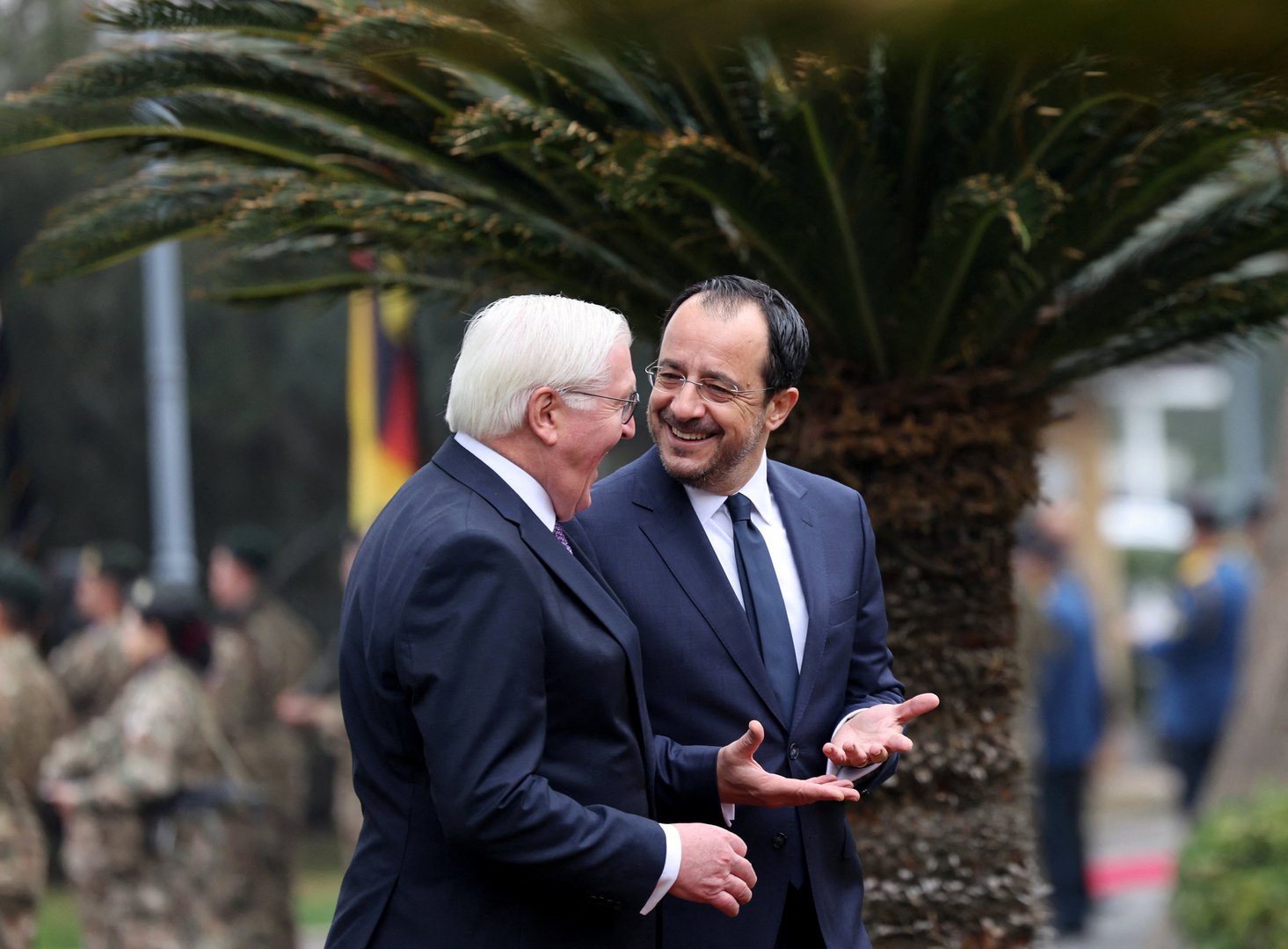 cypriot president nikos christodoulides and german president frank walter steinmeier walk during a welcome ceremony outside the presidential palace in nicosia