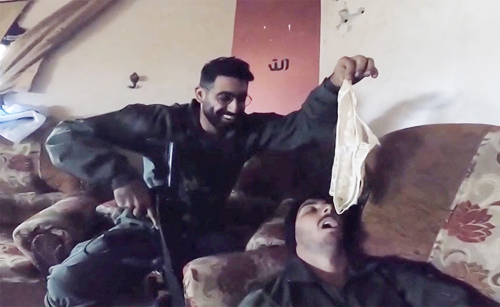 image Israeli soldiers play with Gaza women&#8217;s underwear in online posts