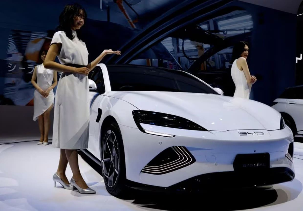 image Facing EV rivals, Europe&#8217;s automakers squeeze suppliers on costs