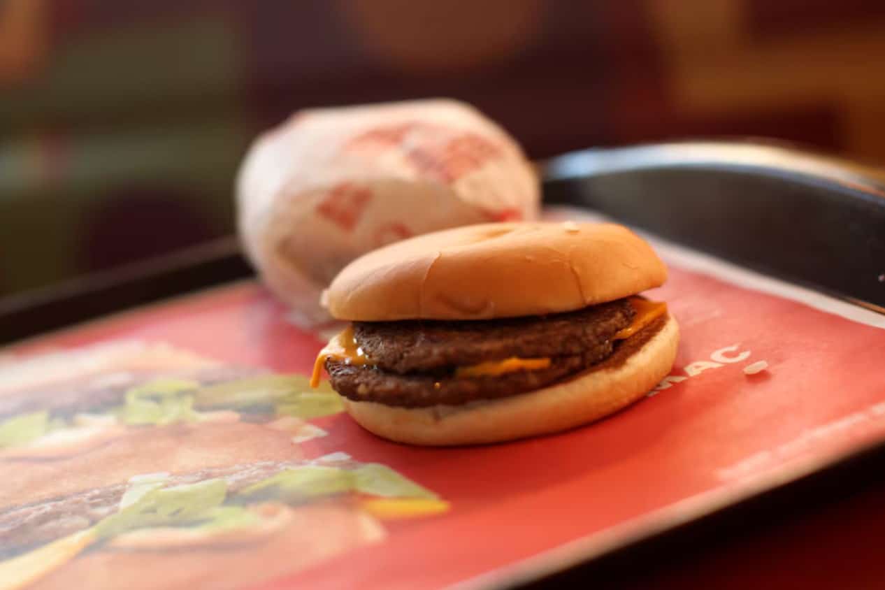 image Fast-food companies seeing low-income diners pare orders