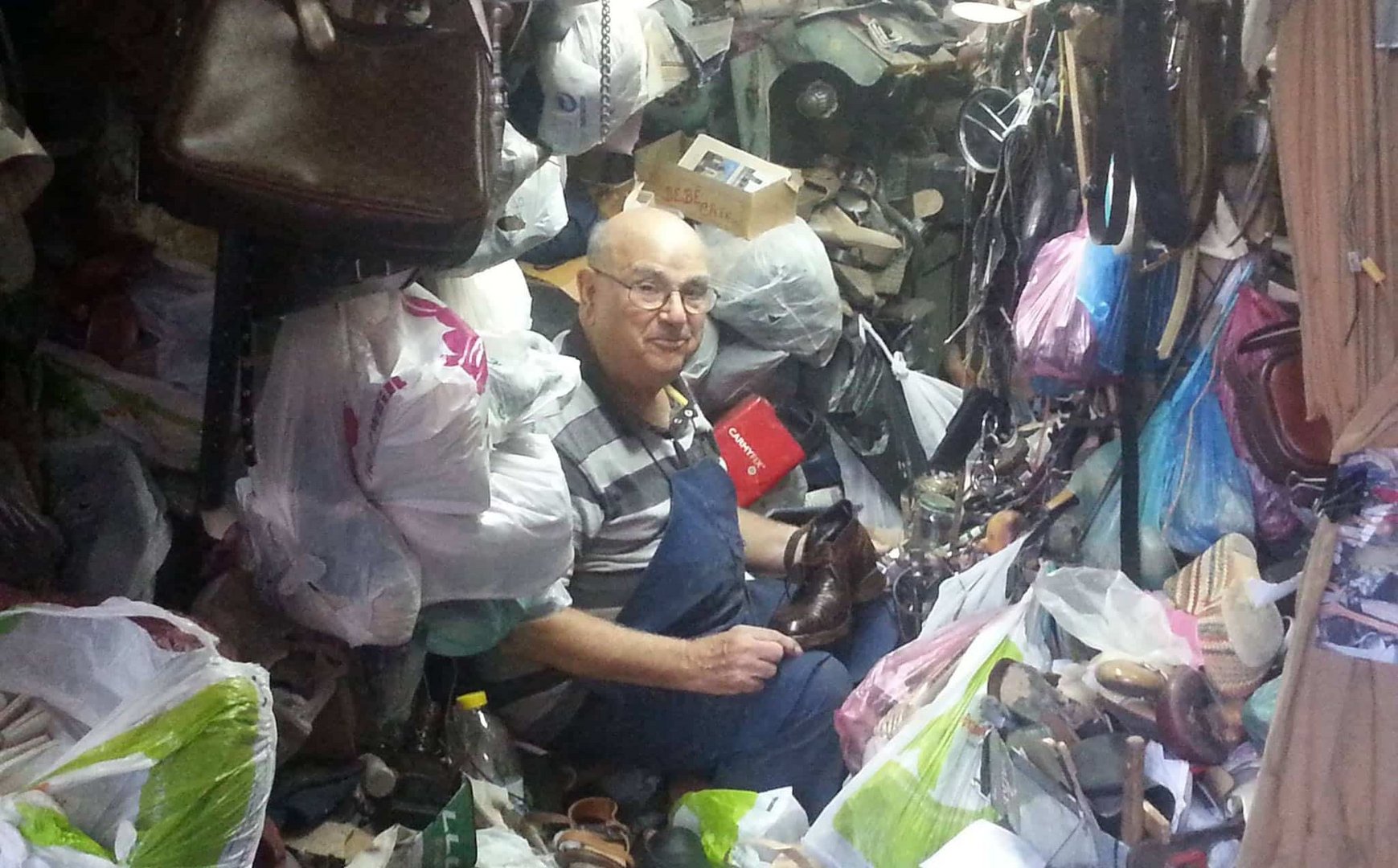 image 95-year-old cobbler repairs his last shoe