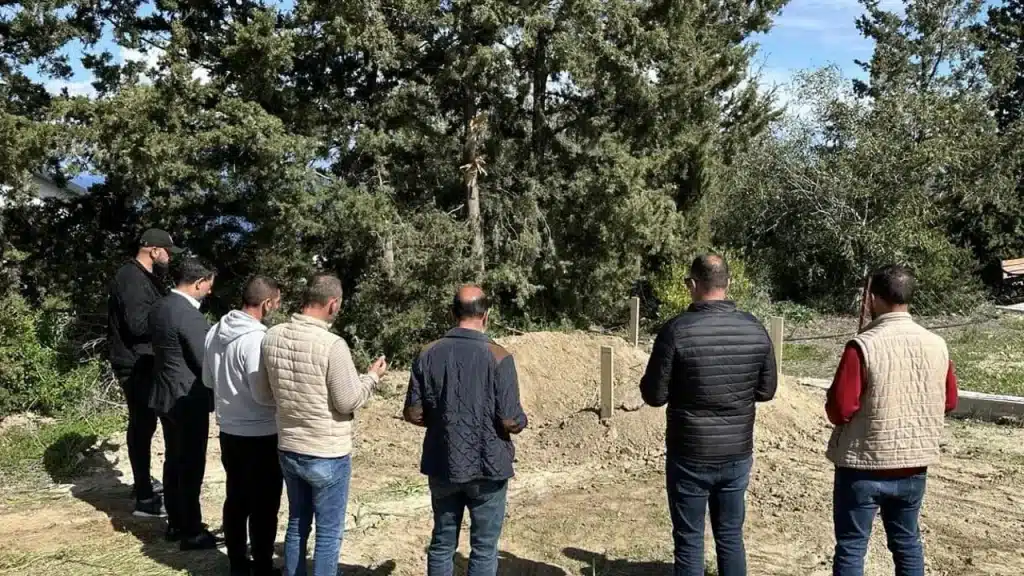 image Funeral held for two more washed up bodies