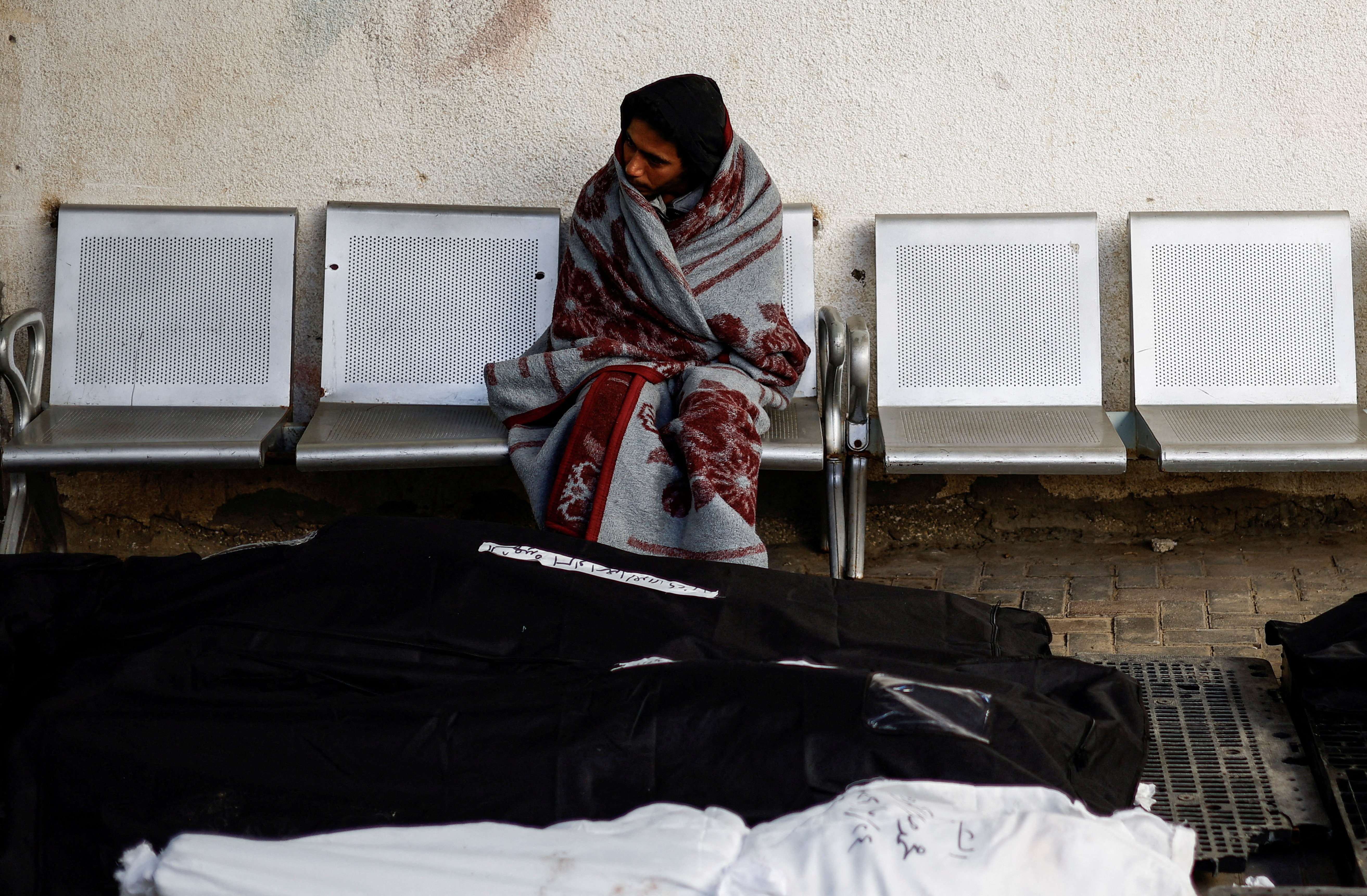 image Israel kills dozens in Gaza attacks and besieges two hospitals, Palestinian medics say