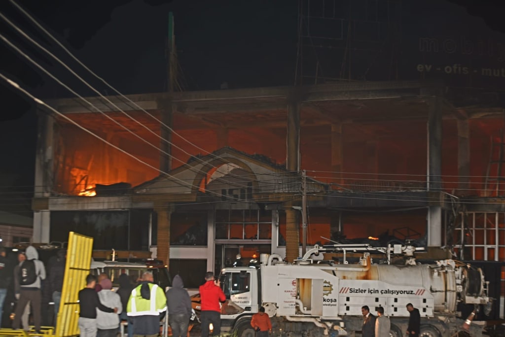 image Three arrested after fire at banner company