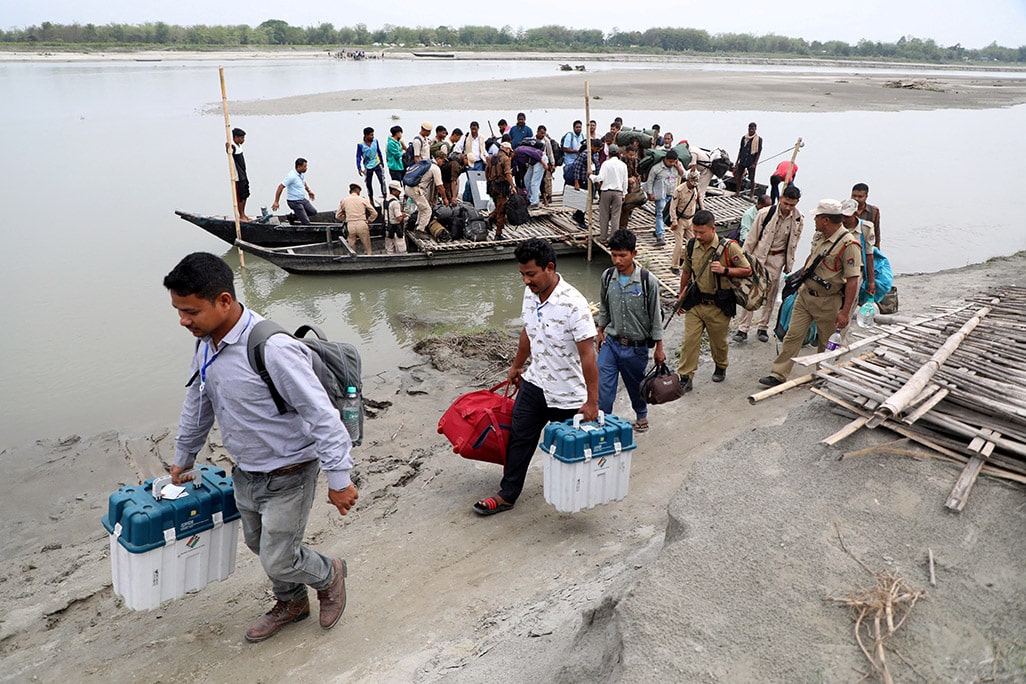 image India&#8217;s election officials climb hills, ford rivers to reach voters