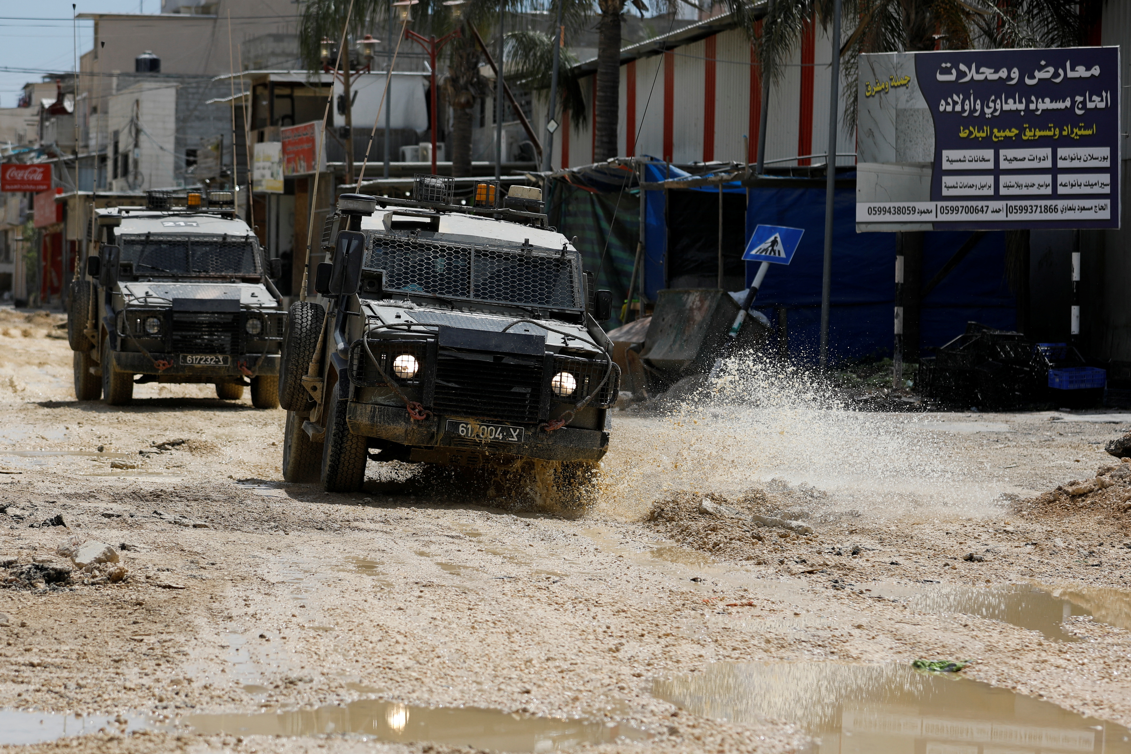 image Israeli troops raid West Bank refugee camp, Gaza fighting continues