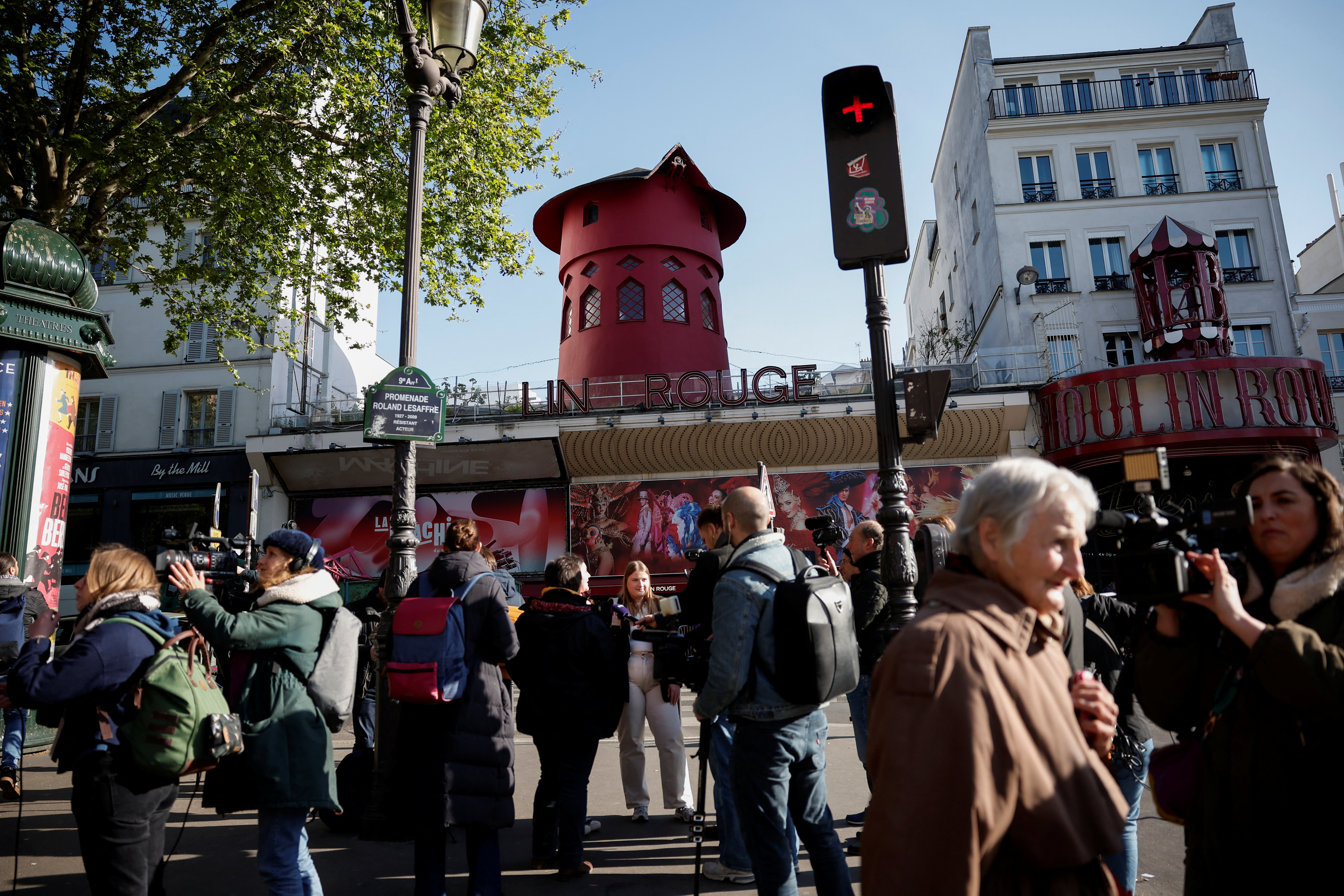 image Windmill sails fall from Paris cabaret club Moulin Rouge