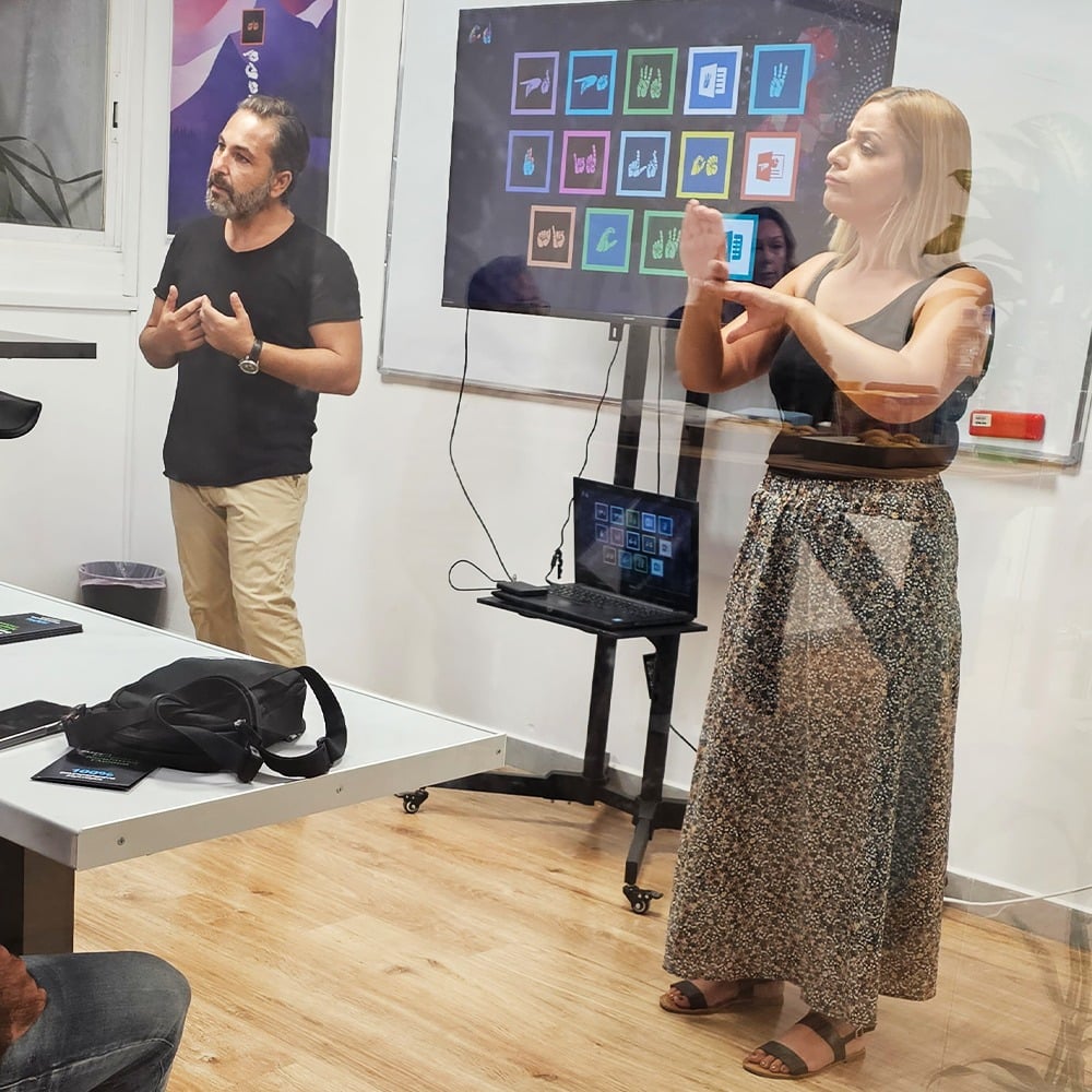 george geratziotis and panayiota themistokleous, a sign language interpreter(2) (1)