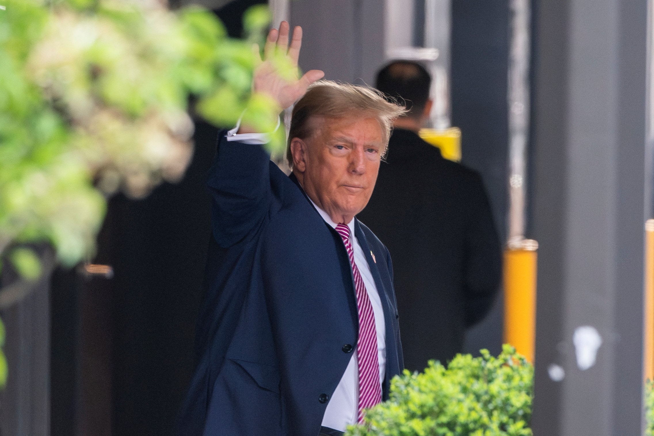 image Trump uses hush money trial to squeeze small donors, court big spenders