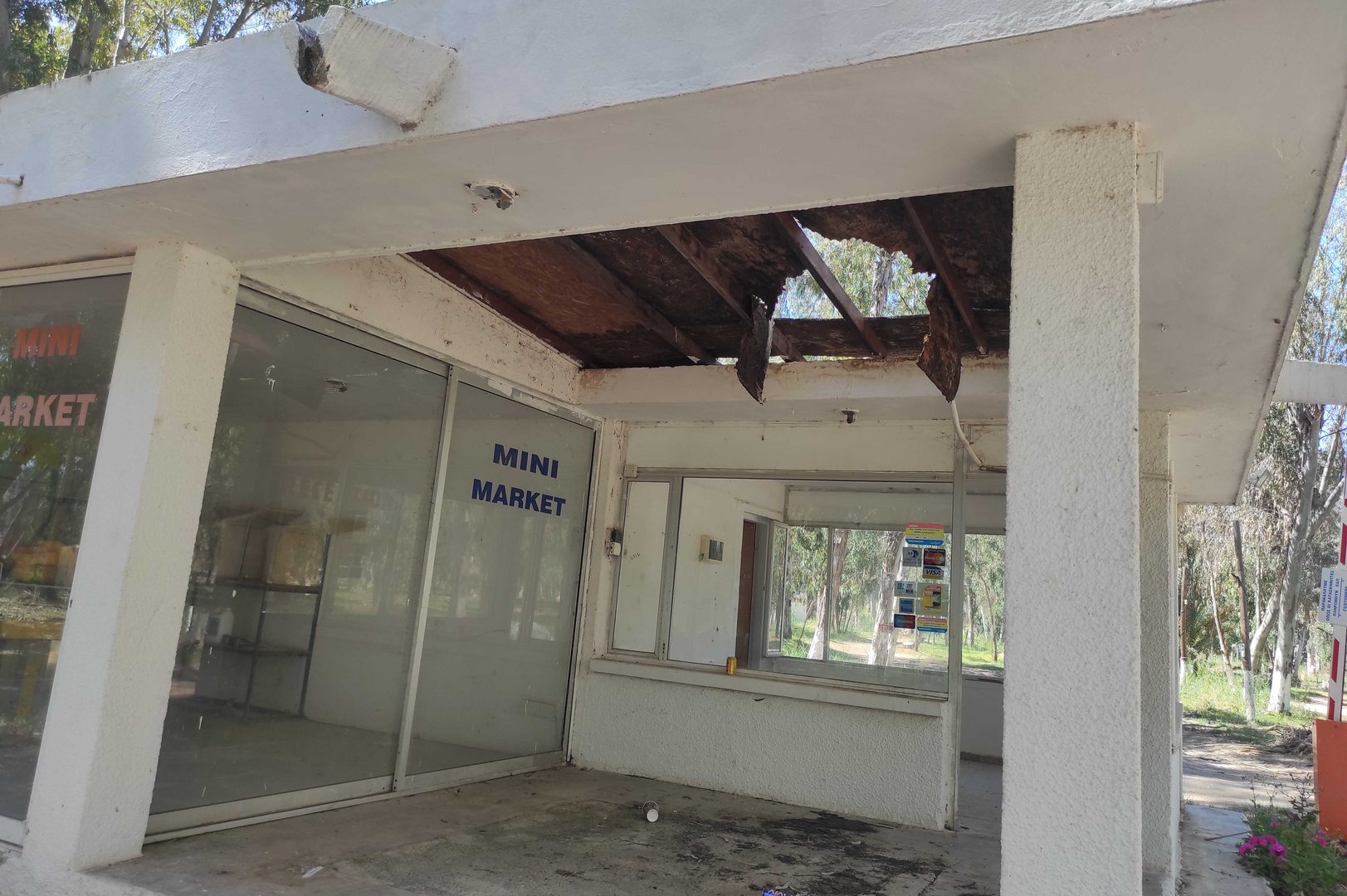 feature iole stripped and derelict mini market