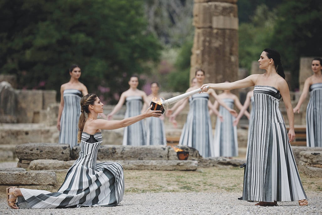 image Paris 2024 torch lit in ancient Olympia, relay under way