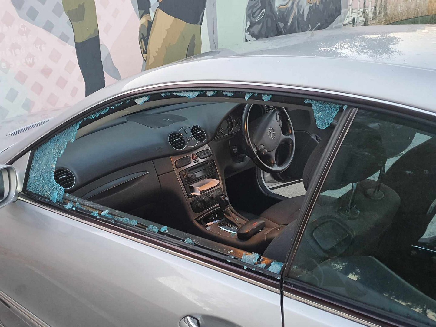 image Municipal councillor and community leader scuffle over car damage
