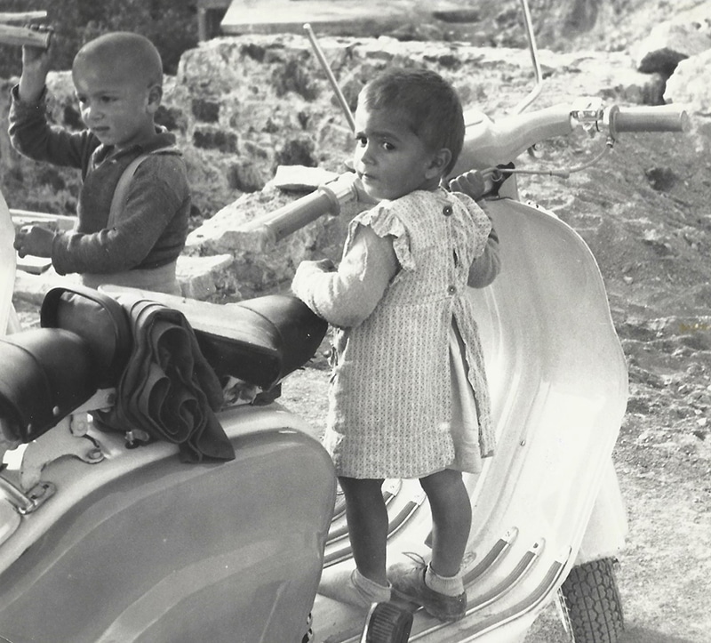 feat 3 local children playing on colin's lambretta