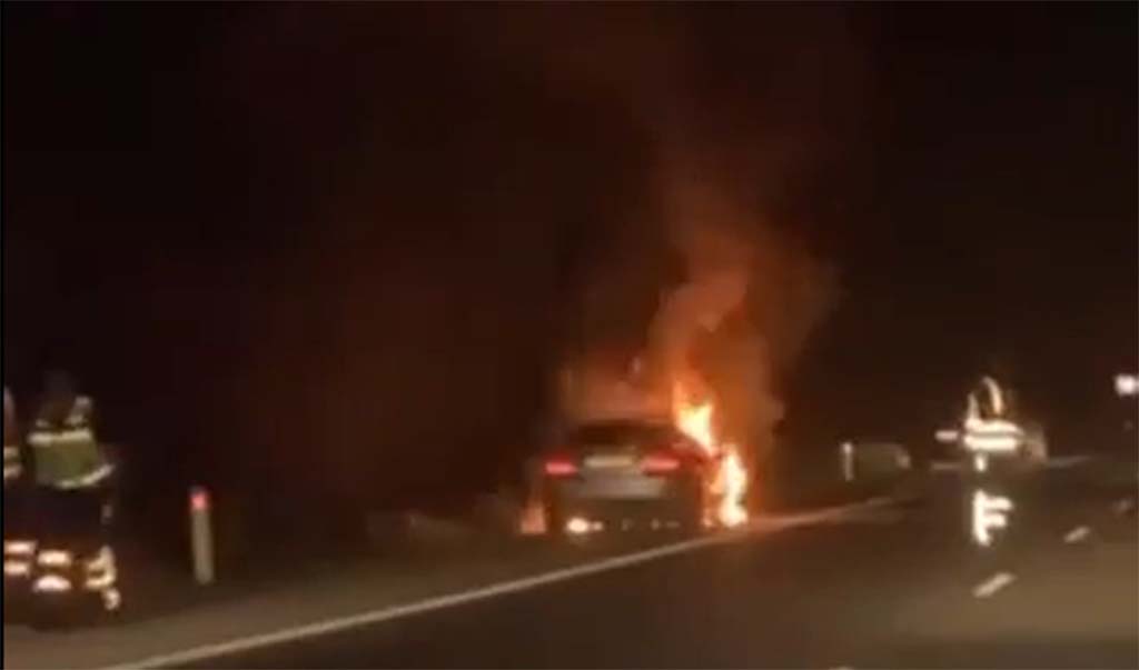 image Three escape car fire
