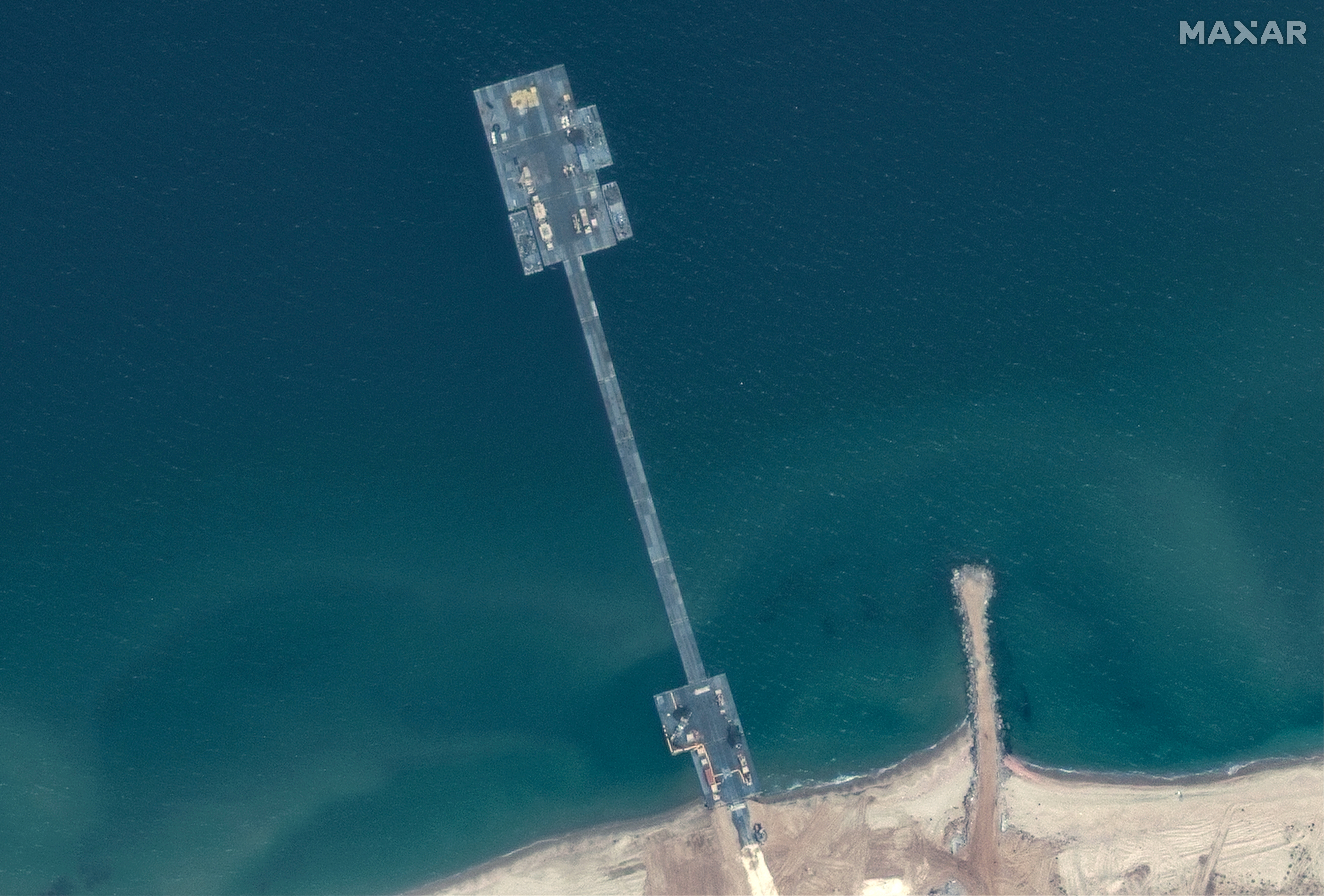 image Gaza pier to resume operations, officials say