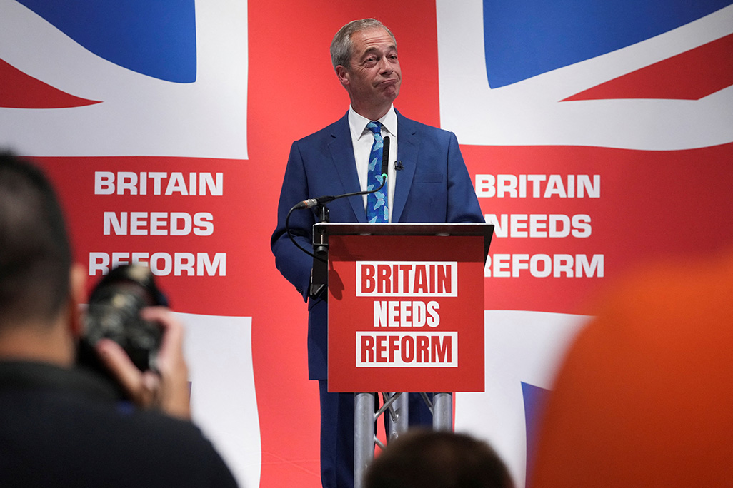 image Woman charged with assault after throwing milkshake at UK&#8217;s Farage