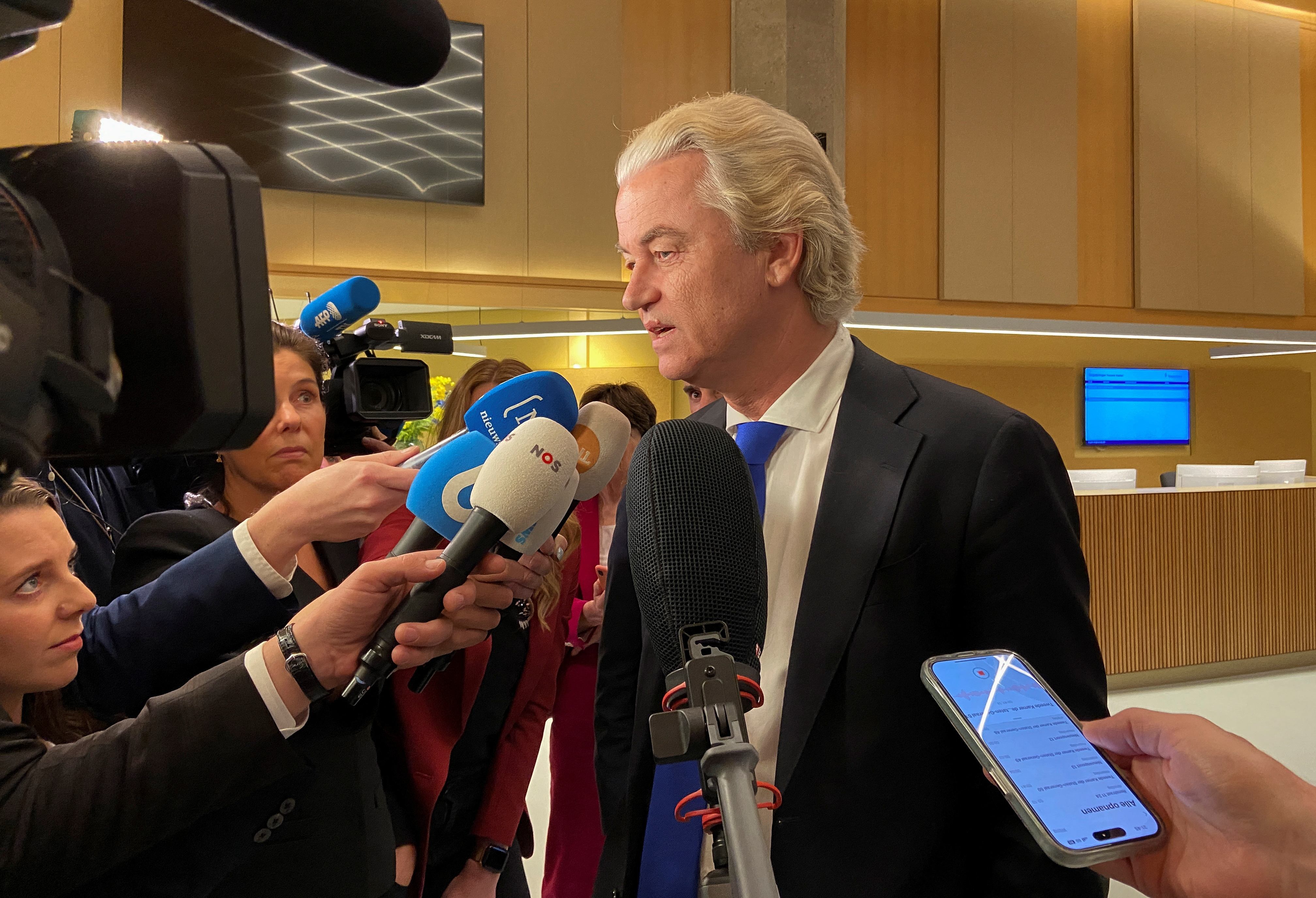 image Dutch left-wing holds off surging Wilders in tight EU election, exit poll shows