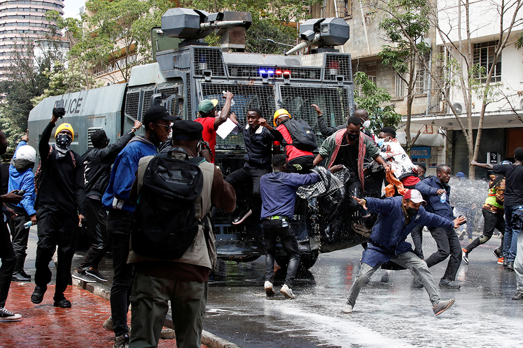 image Kenya president backs down on tax hikes after deadly unrest