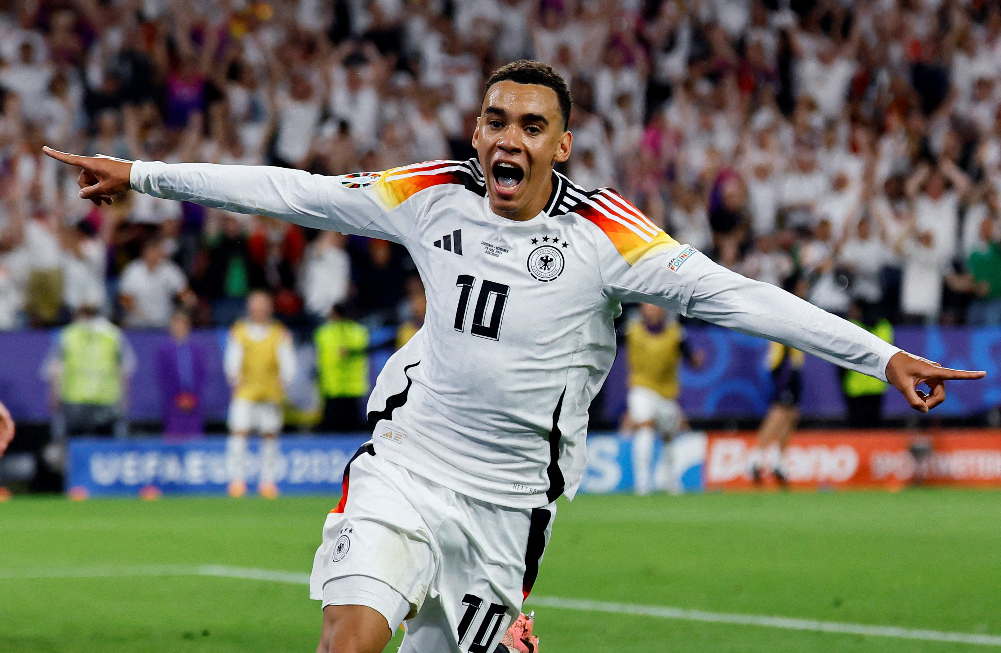 image Germany weather storm to beat Denmark and reach quarters