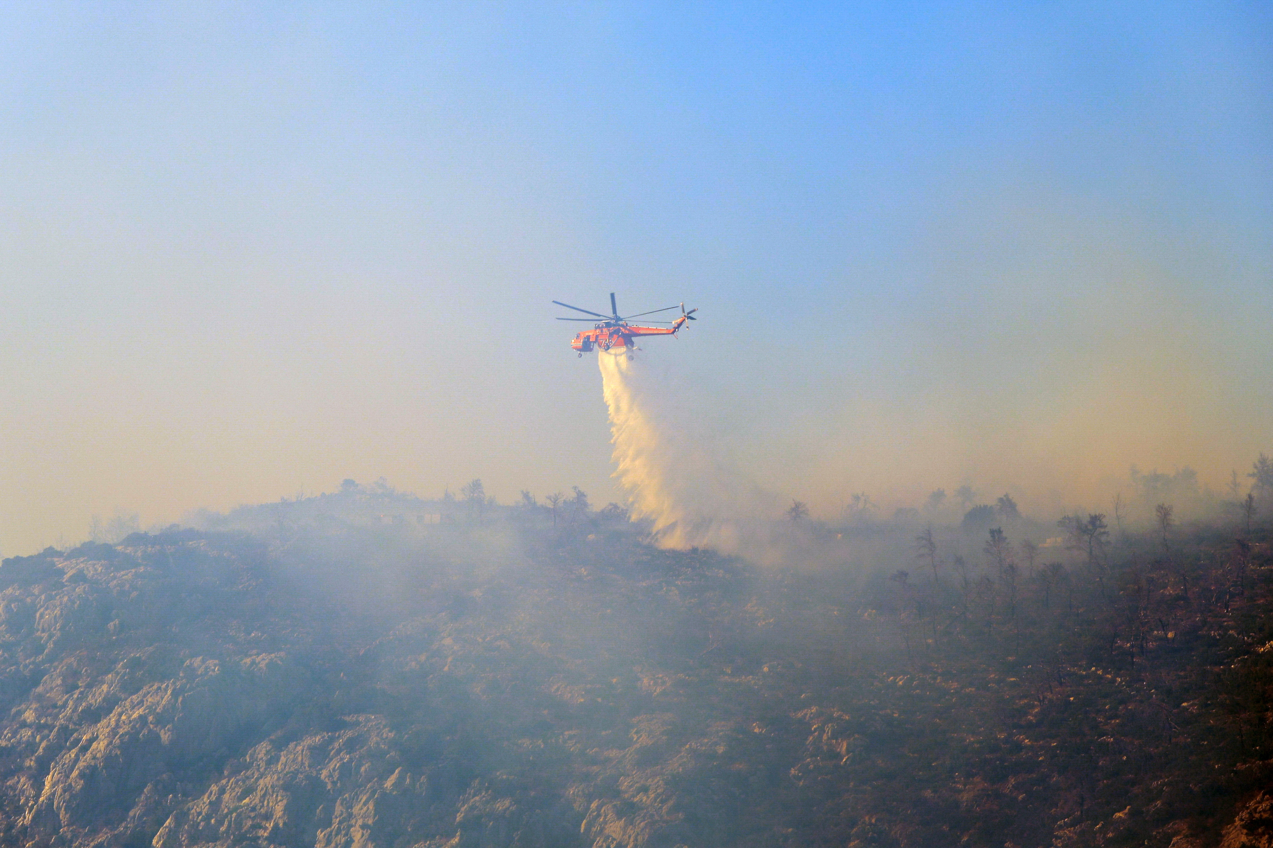 cover Greek firefighters tame wildfire on island of Serifos