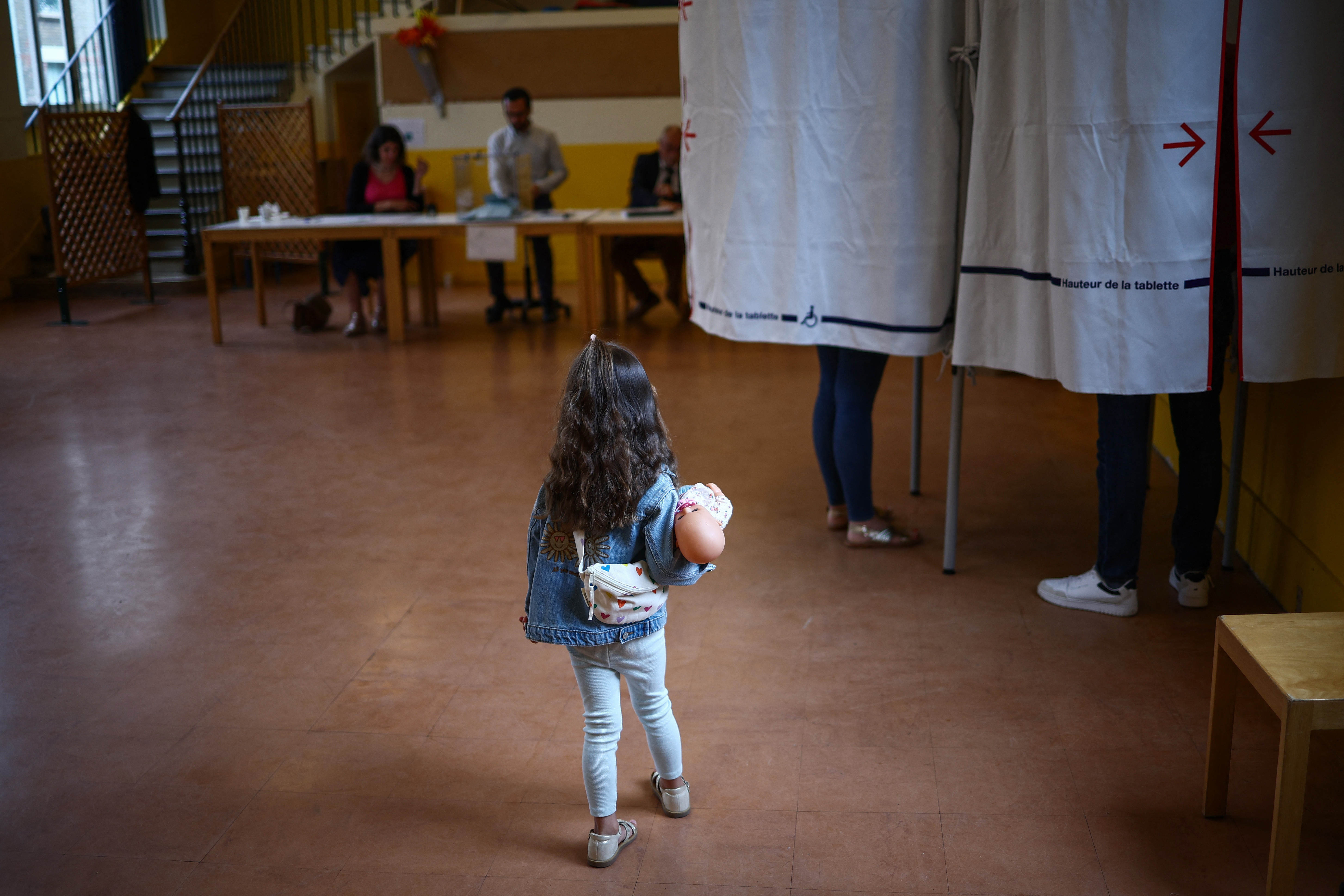 image French turn out in force for parliamentary election, far right seeks power
