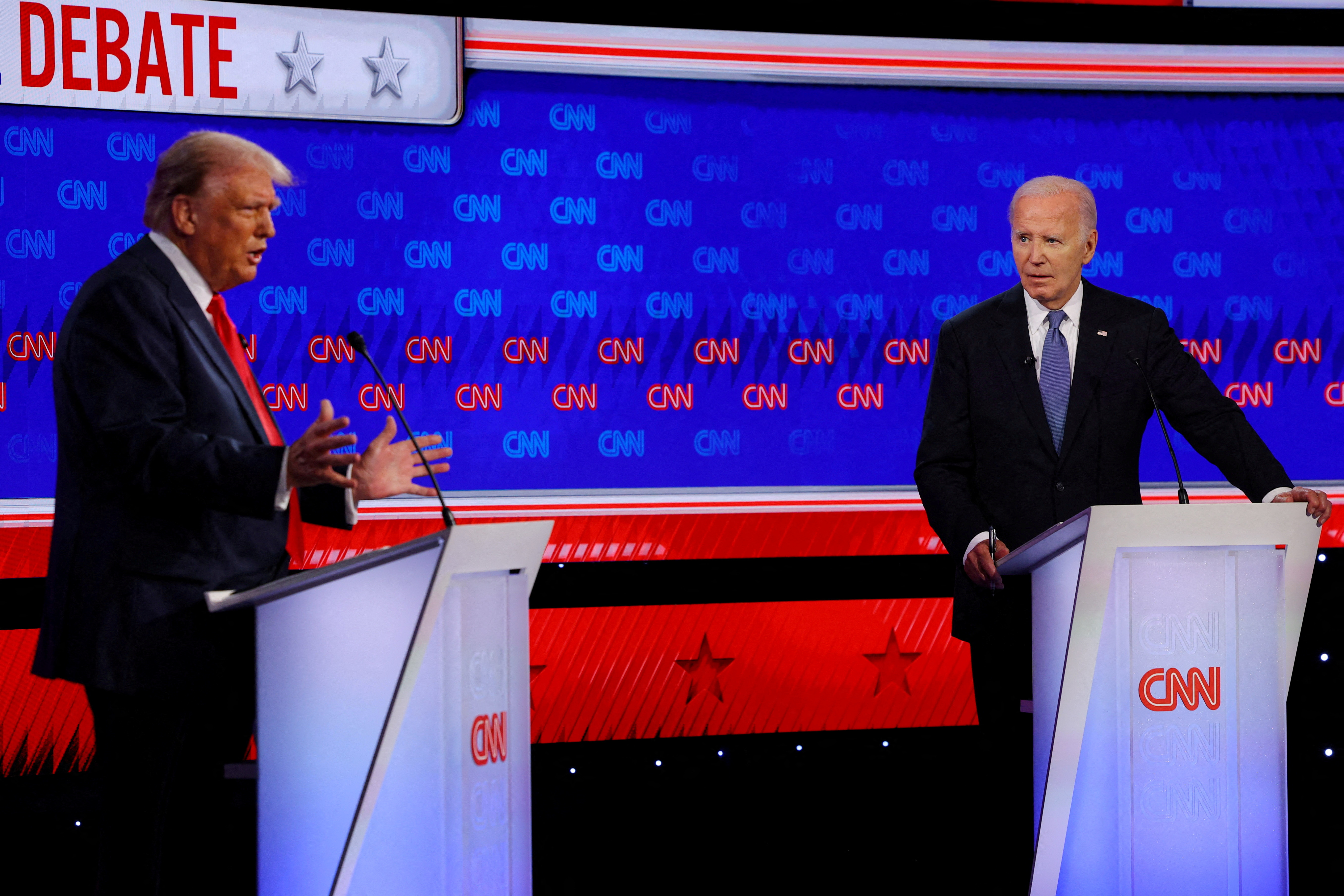 image After assassination attempt, Trump and Biden seek calm, unity