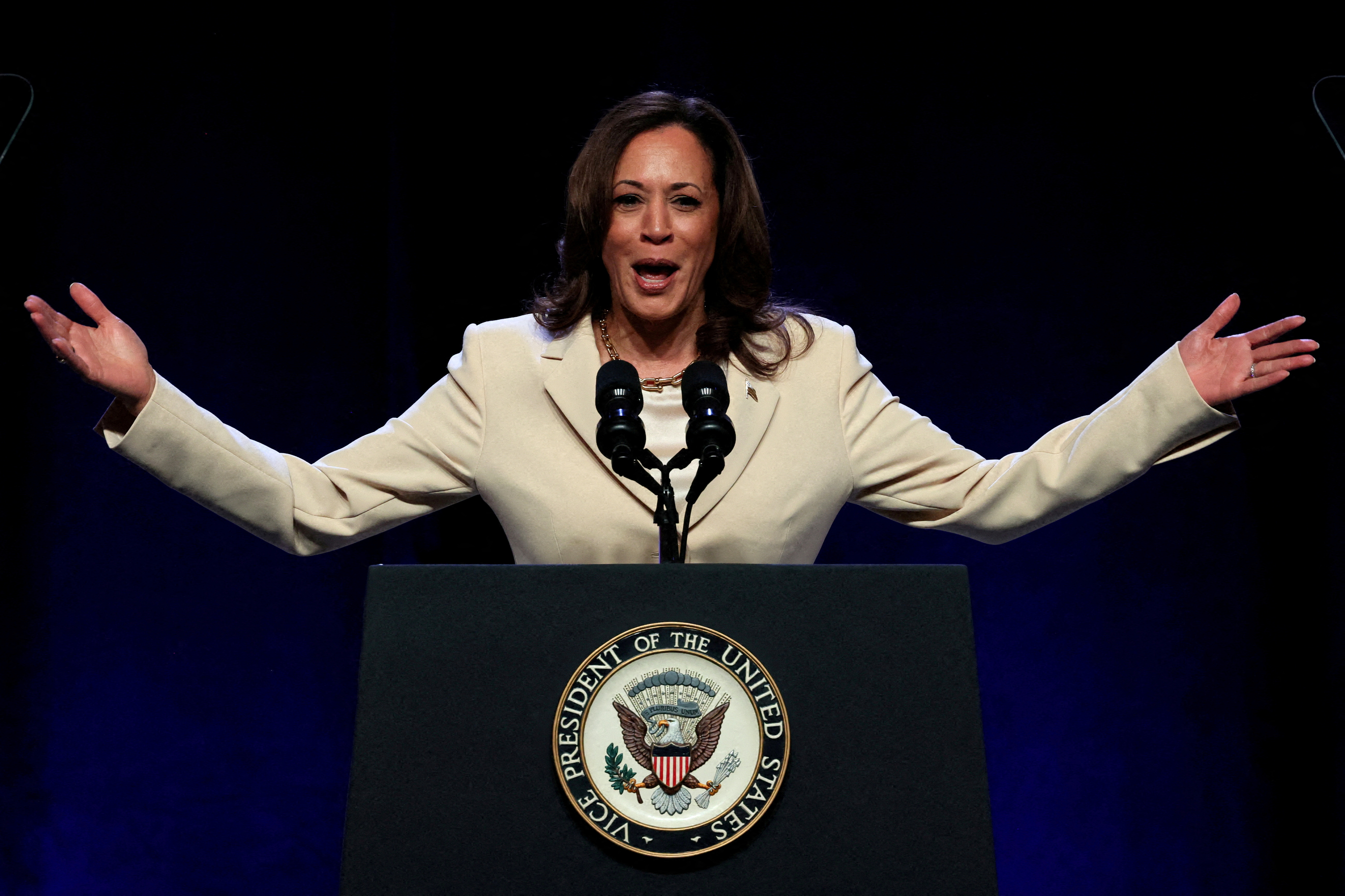 image Harris calls on Trump to debate with mics &#8216;on the whole time&#8217;