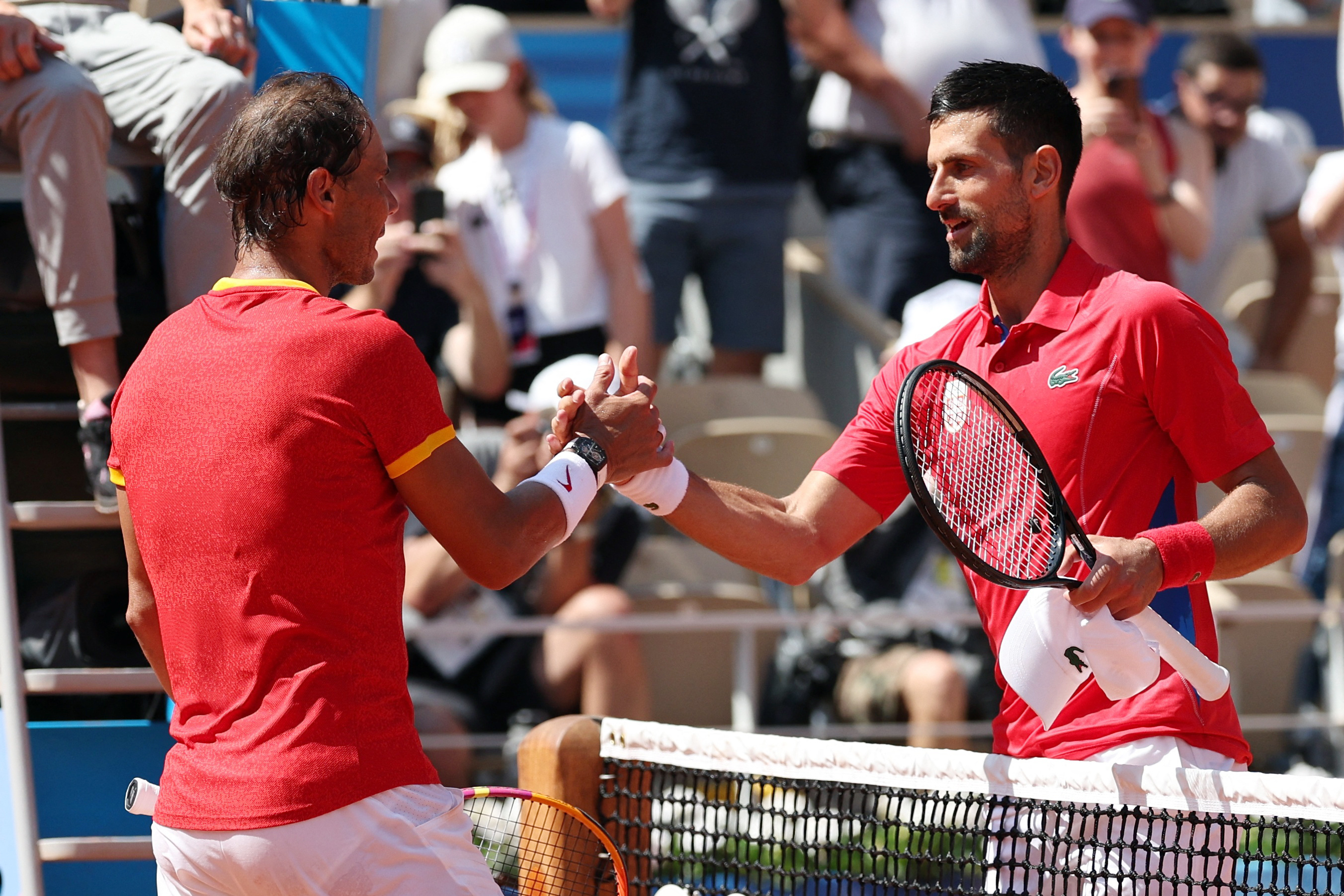 image Djokovic survives wobble to ease past error-prone Nadal at Paris Games