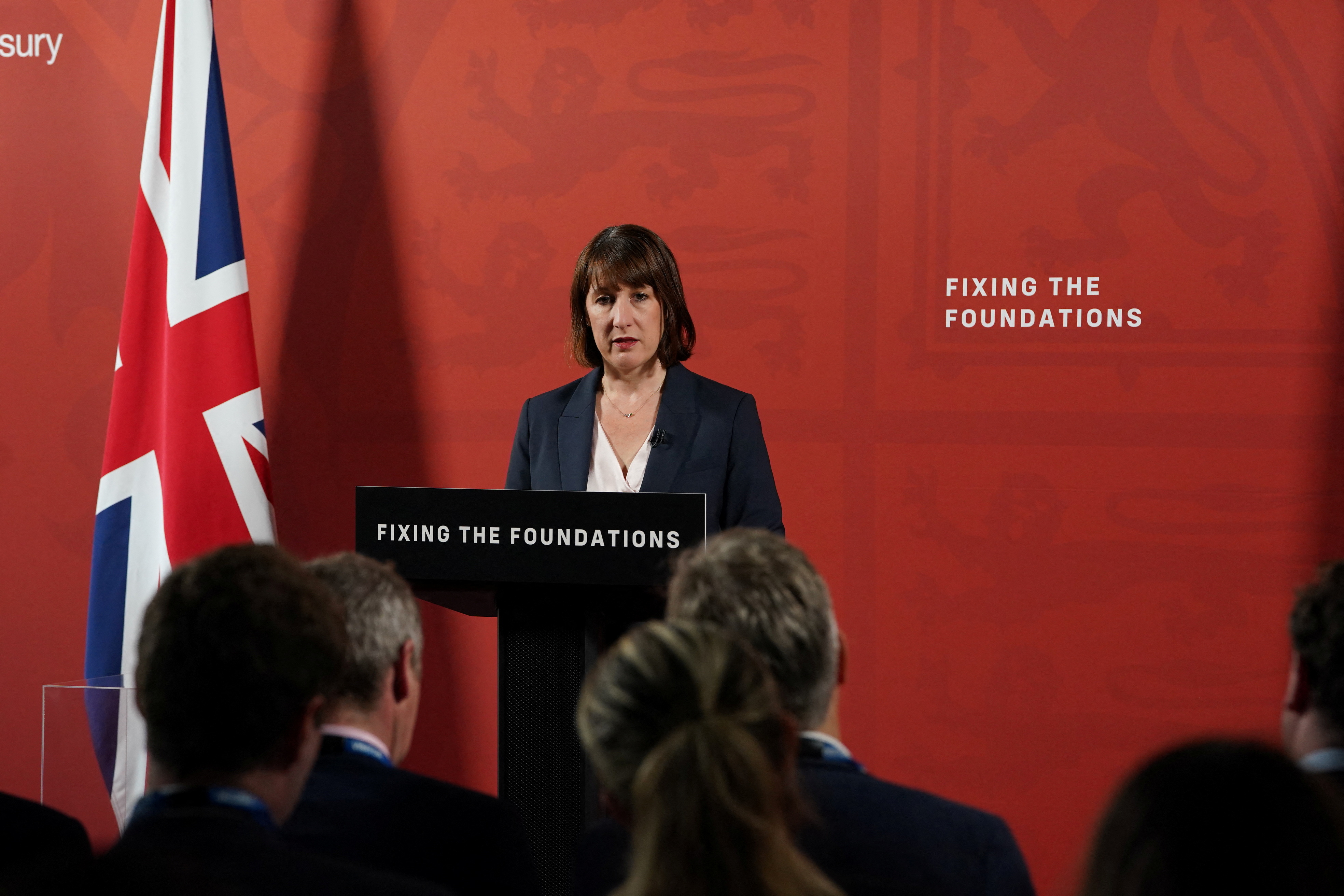 image UK revises down economic growth but signs of strength remain