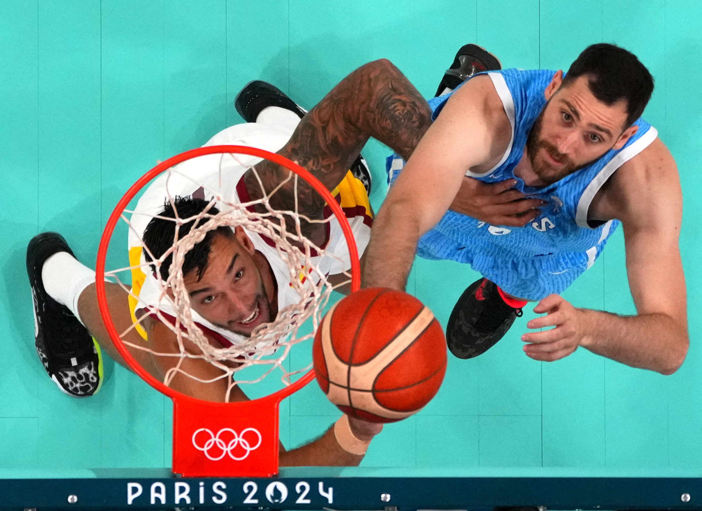 image Spain rally past Greece, Canada stun Australia