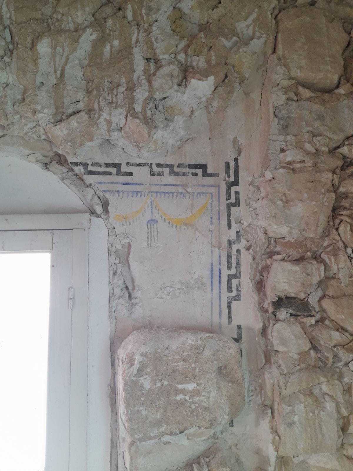 image Painted motifs found on walls of Terra mosque 