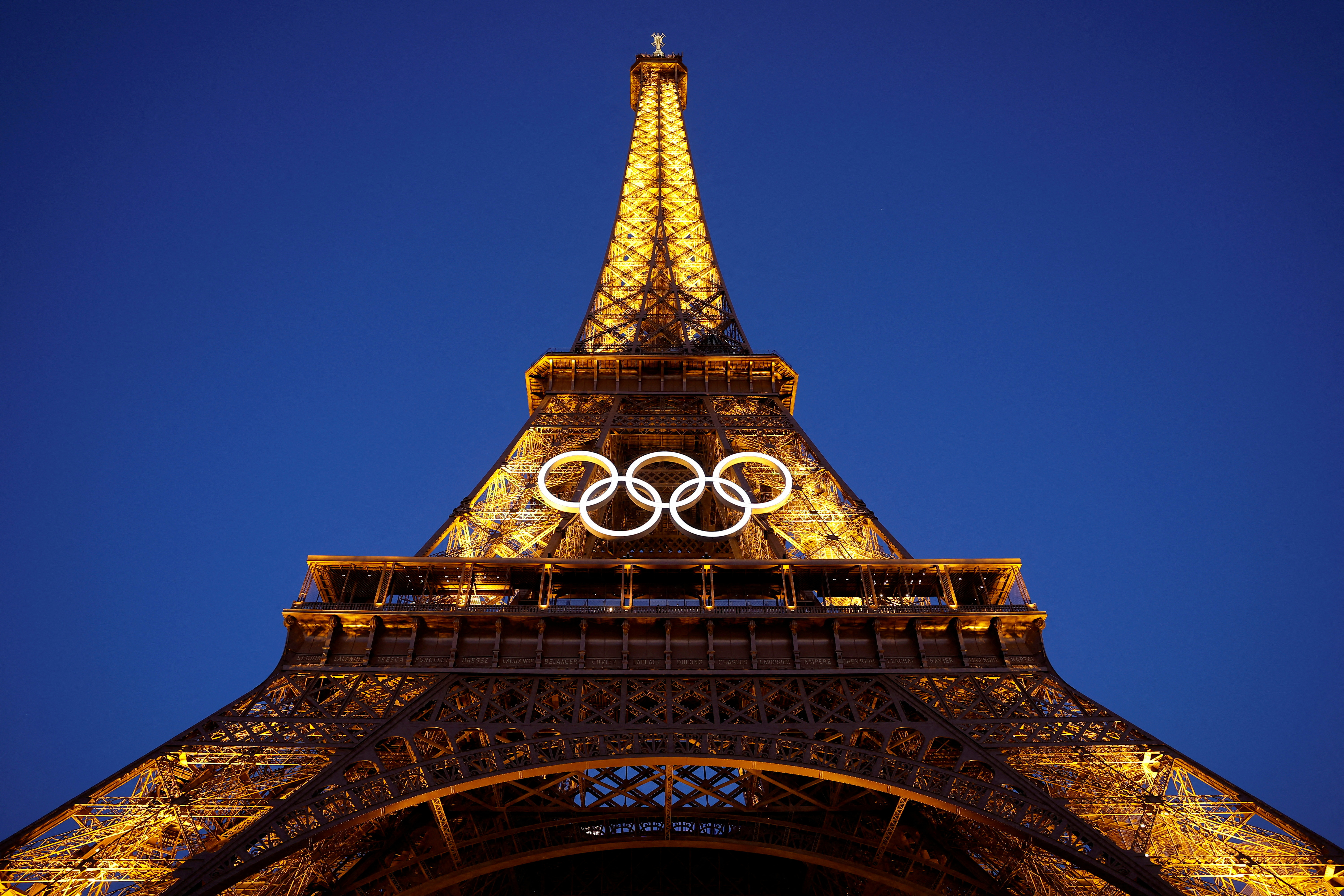 image Climber scales Eiffel Tower on last day of Paris Olympics, media reports