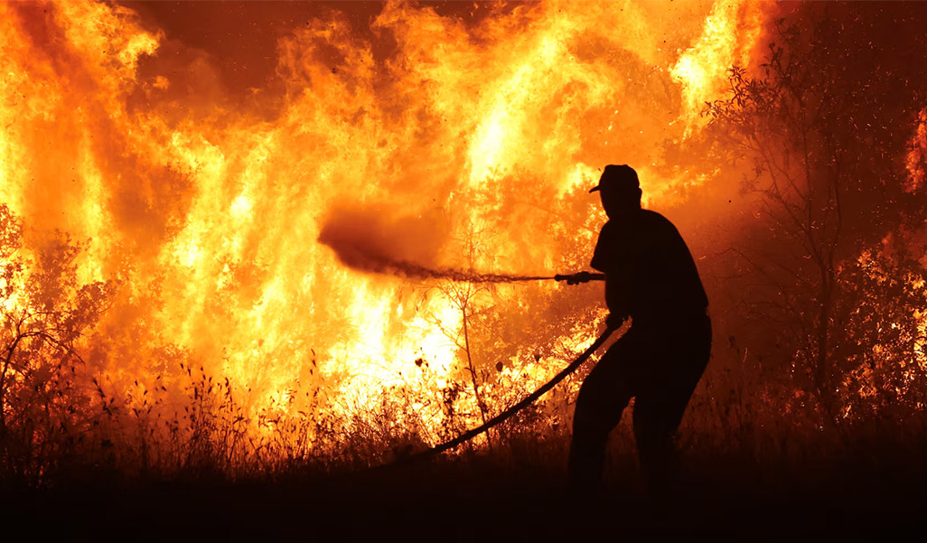 image Greek court convicts three vigilantes for detaining migrants over fire
