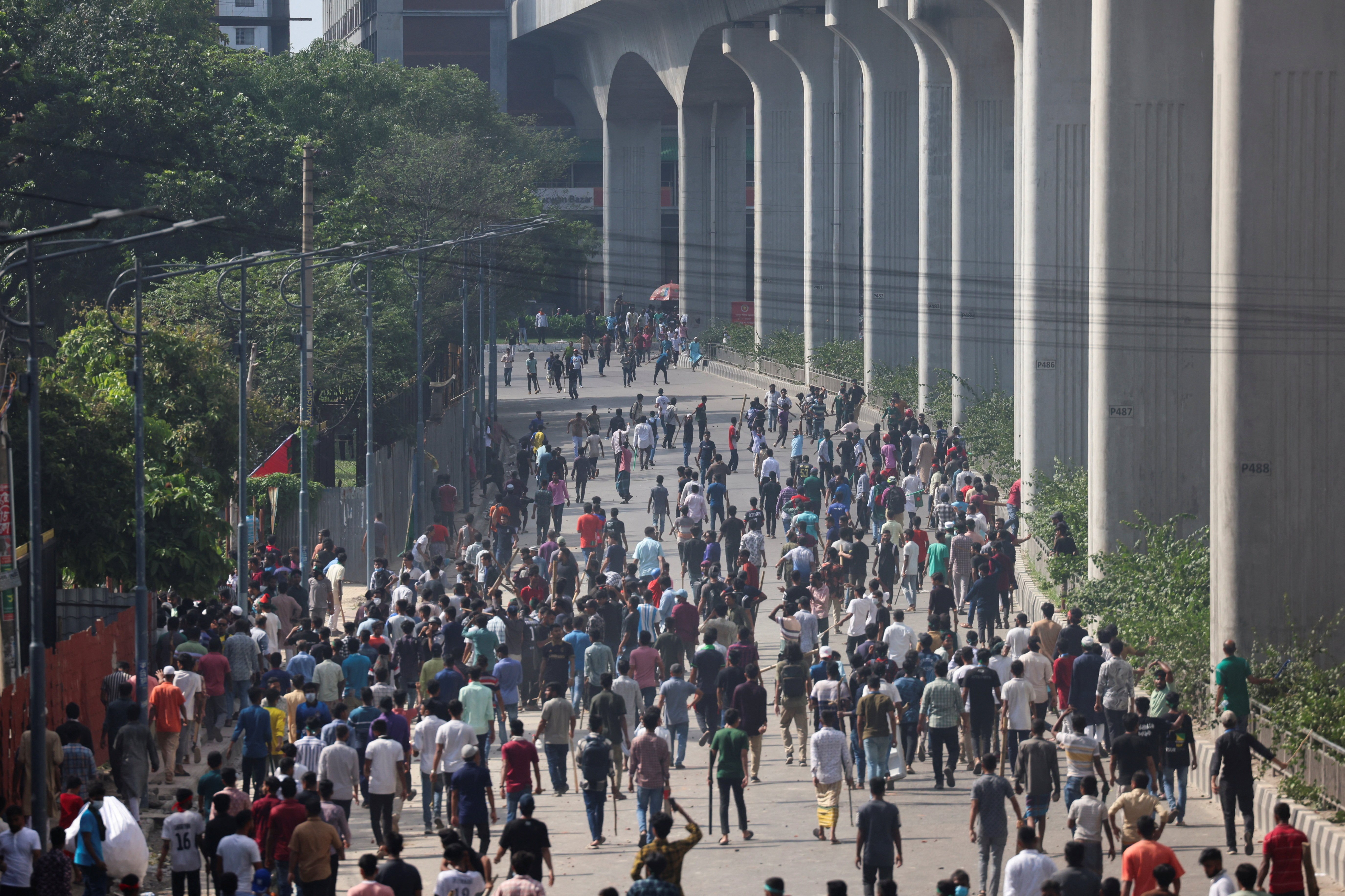 image Bangladesh protesters call for march to Dhaka in defiance of curfew, at least 91 killed in protests