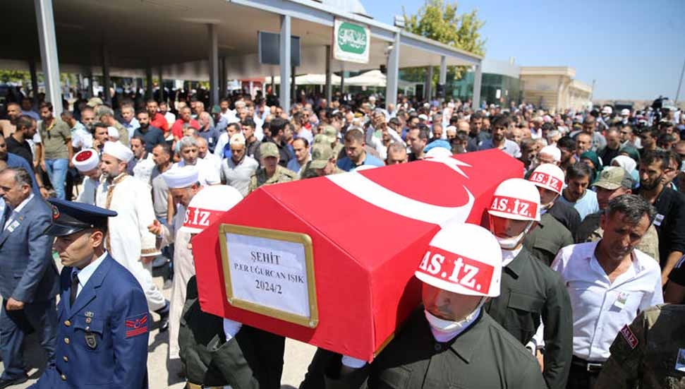 image Funeral held in Turkey for dead soldier, Tatar meets crash survivors