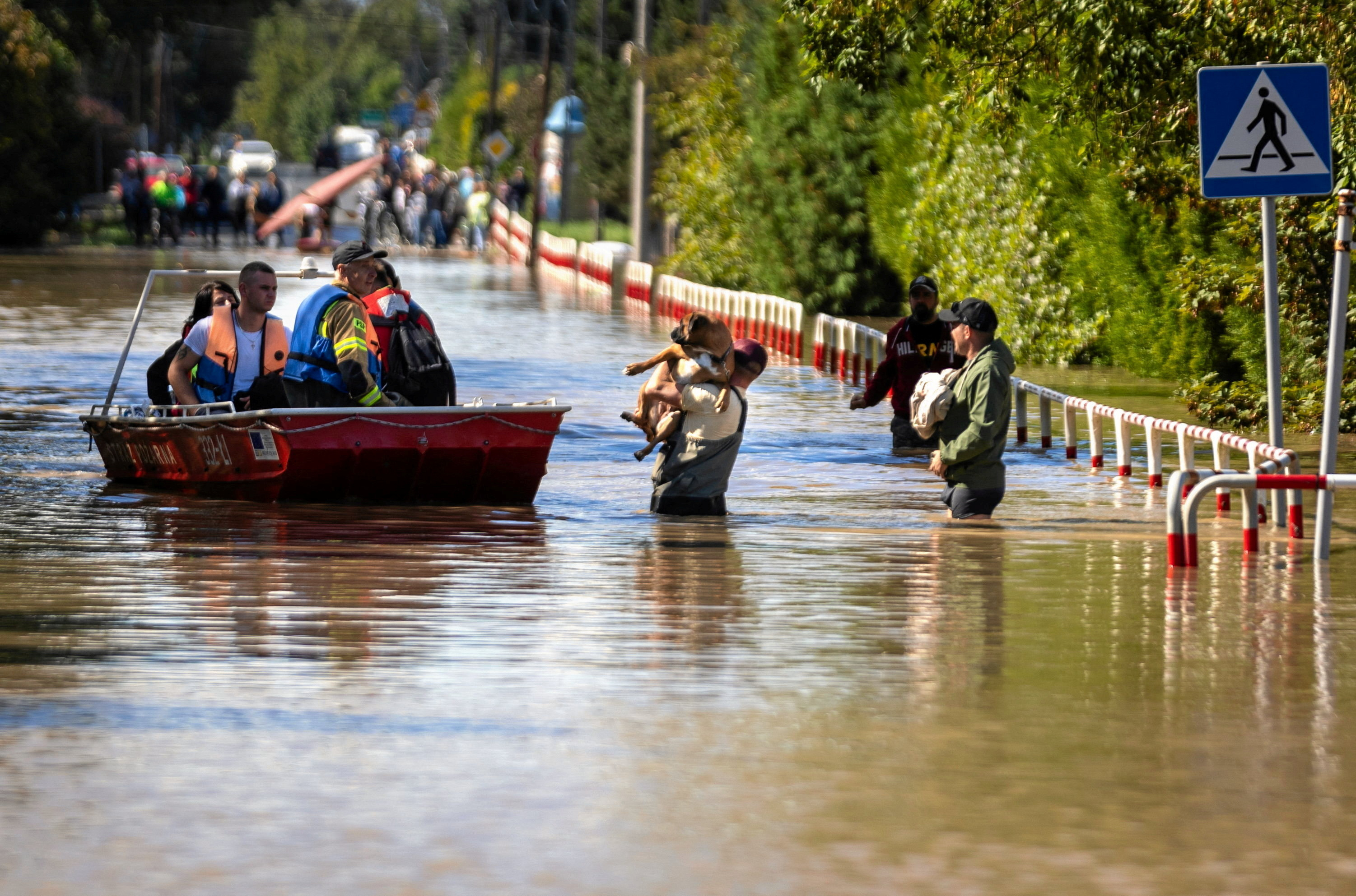 cover Floods claim more lives as torrential rain pounds central Europe