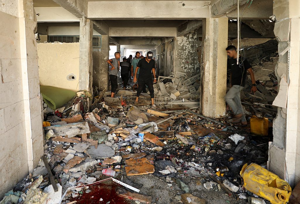 image Palestinians say Israeli strike killed 22 in shelter, army says militants hit