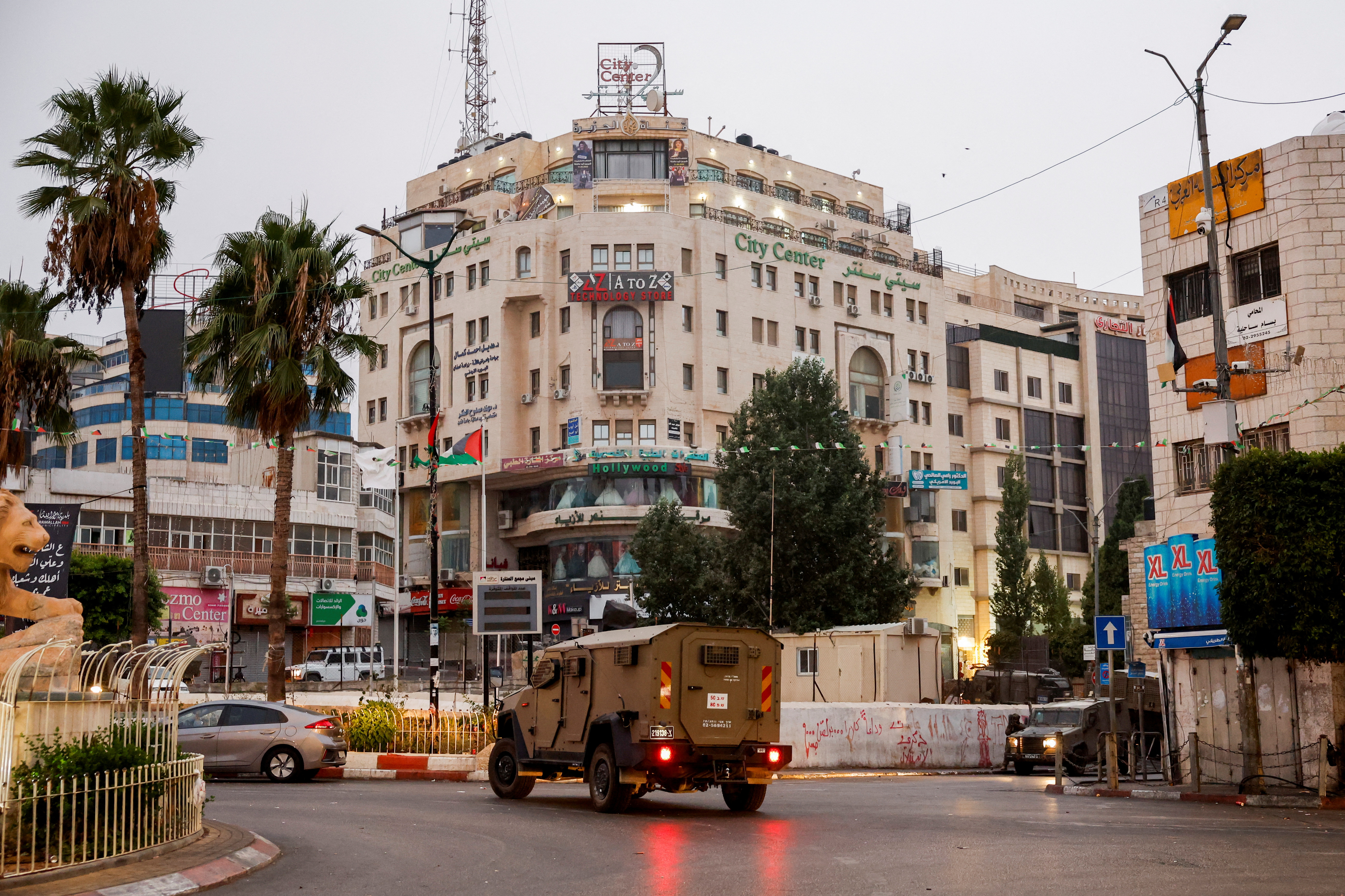 image Israeli forces raid Al Jazeera bureau in West Bank with closure order